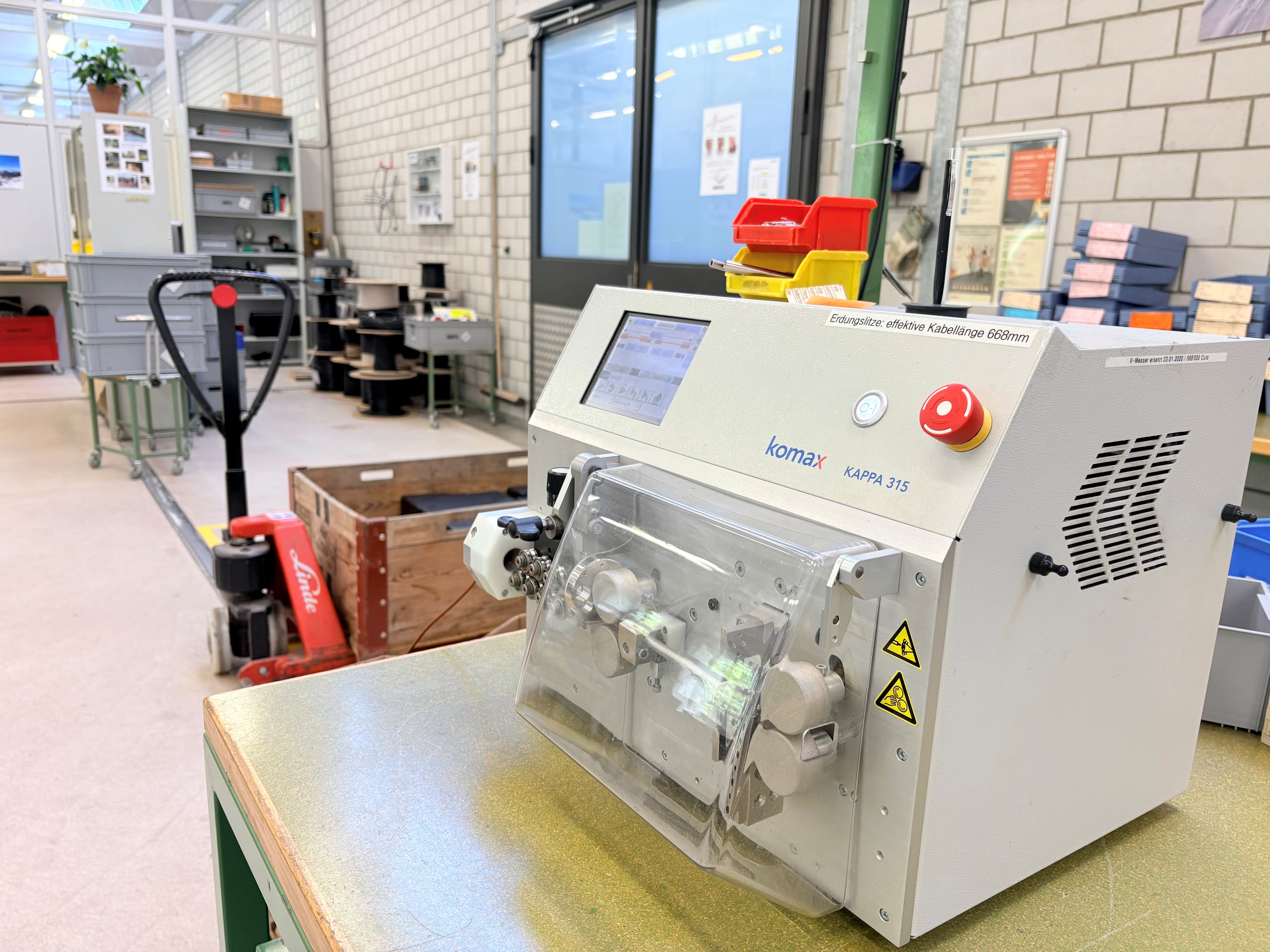 Komax Ablängemaschine